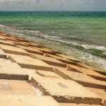 Rock revetment seawalls