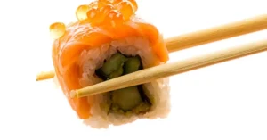 “Sushi order topped with salmon” is a type of clue that tests the solver’s familiarity with international cuisine and specific culinary terms.